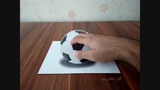 نقاشی سه بعدی توپ فوتبال روی کاغذ