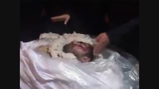 حضور خانواده و مقامات سپاه در کنار پیکر پاک هادی باغبانی سپاهی که در سوریه به شهادت رسیده)