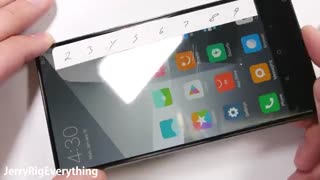 تست مقاومت بدنه شیائومی Mix