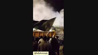 پرچم گردانی حضرت ابالفضل العباس در نیمه های شب در محل آواربرداری پلاسکو